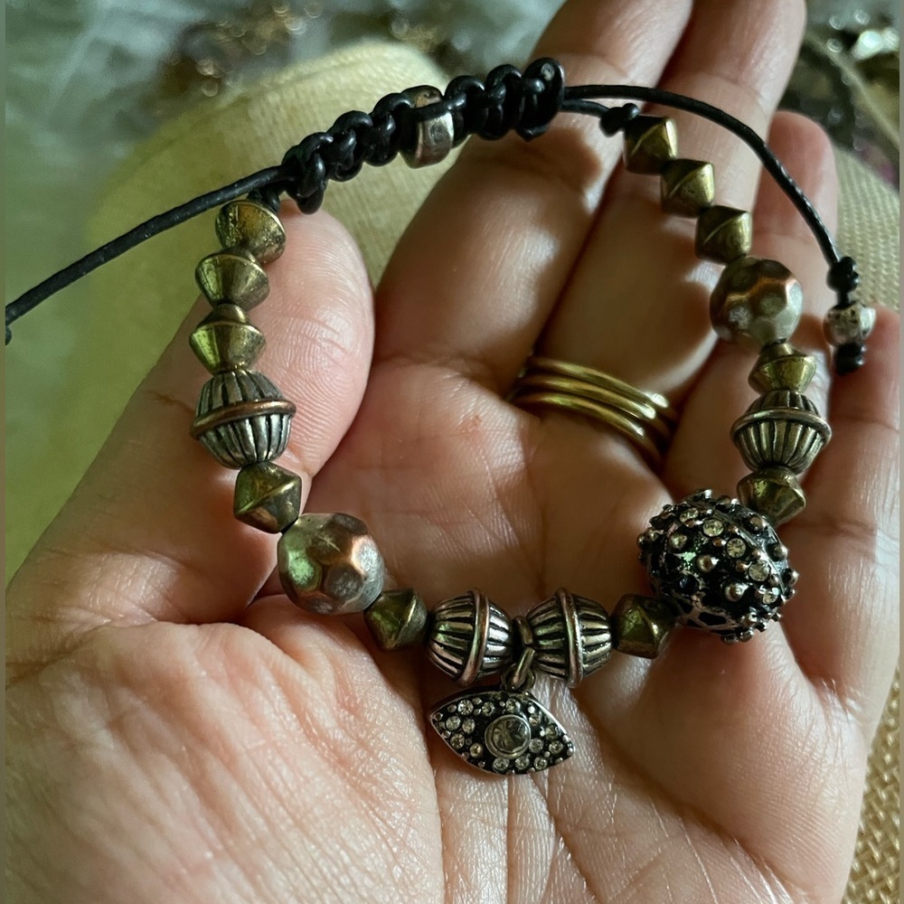 Silver charm evil eye bracelet